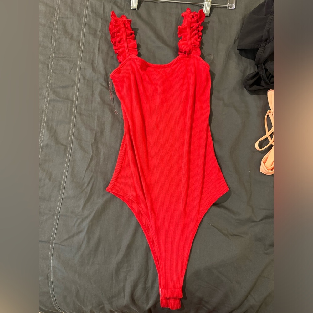 Vestique ruffle red bodysuit